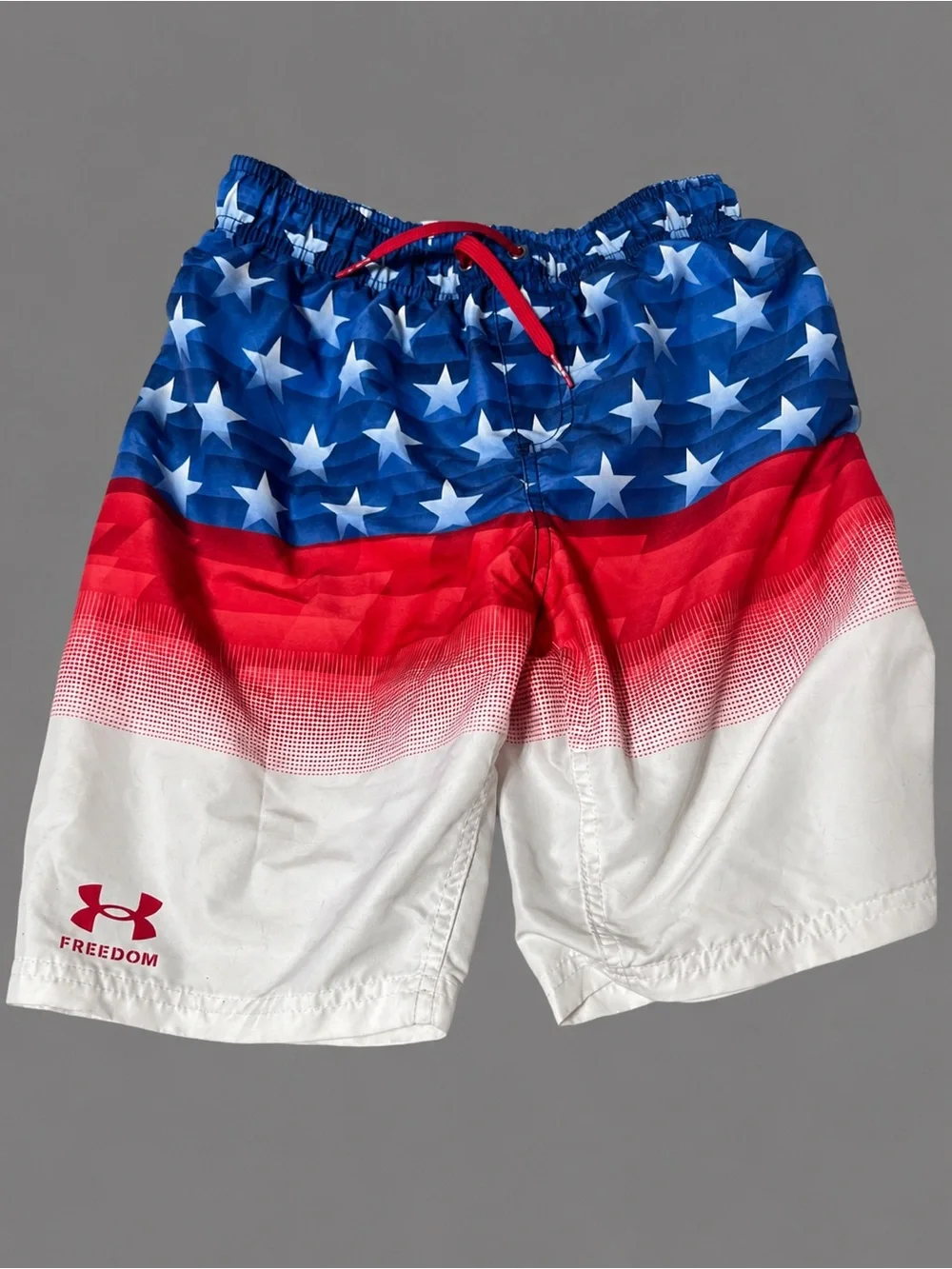 Under Armour Boy’s Red/White/Blue Star Print Swim Trunks NWOT